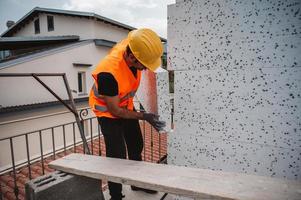 Polystyrene thermal cladding for energy saving on a construction site photo
