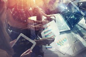 Team of business person works together. Concept of teamwork. Double exposure with internet connection network effects. photo