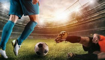 Close up of a football action scene with competing soccer players at the stadium photo