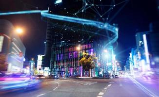 Fast connection in the city at night. Abstract technology background photo