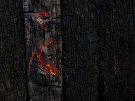 burned wood texture background photo