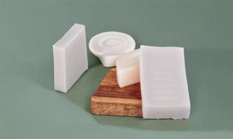 multiple soap on green background photo