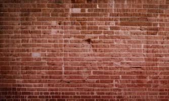 red brick wall texture background photo