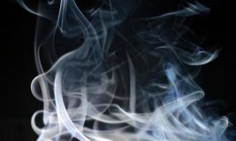 smoke on black background photo