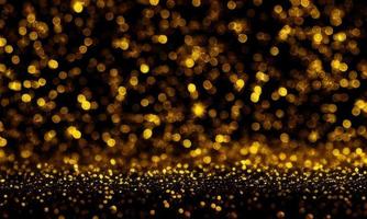 background with gold  particles and bokeh photo