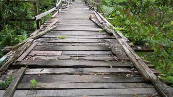 Slowly move over broken wooden bridge video