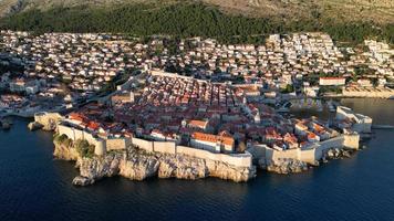 Aerial drone view of the Old historic city of Dubrovnik in Croatia, UNESCO World Heritage site. Famous tourist attraction in the Adriatic Sea. Fortified old city. Tourism and travel to Croatia. video