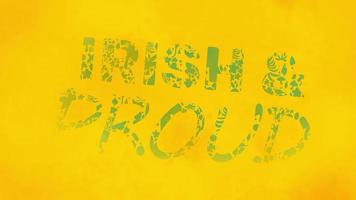 frase irlandês e orgulhoso, dentro verde texto decorado dentro folhagem com tinta revelar efeito em amarelo texturizado fundo video