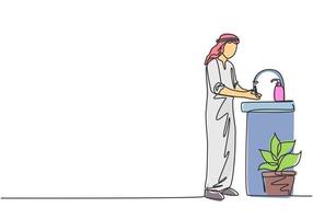 dibujo de línea continua única un hombre árabe se lava las manos en el fregadero, hay un dispensador de jabón junto al grifo y una maceta de plantas debajo del fregadero. Ilustración de vector de diseño gráfico de dibujo de una línea.