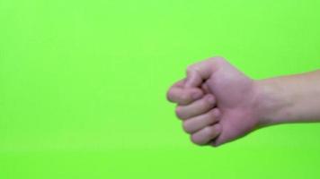 maschio mano con pollice su con verde schermo video