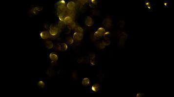 il movimento di il oro bokeh luci per natale, ballo festa ,astratto splendore movimento sfondo video