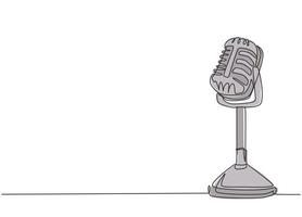 One single line drawing of retro old classic radio microphone for broadcasting. Vintage loudspeaker announcer item concept continuous line draw design vector graphic illustration