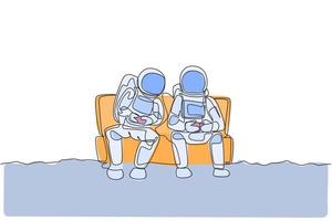 One single line drawing two young happy astronauts siting on sofa and playing video game in moon surface vector graphic illustration. Cosmonaut outer space concept. Modern continuous line draw design