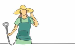 Continuous one line drawing female farmer with a thumbs-up gesture wearing a straw hat and carrying a shovel to work on the farm at harvest time. Single line draw design vector graphic illustration.