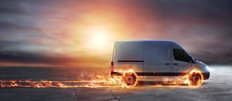 Super fast delivery of package service with van with wheels on fire photo