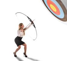 Businesswoman point to success in business with arrow photo