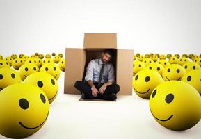 Alone desperate businessman in the middle of happy smileys . 3D Rendering photo