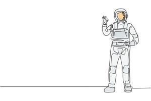 El astronauta de un solo dibujo de línea continua se para con un gesto bien vistiendo un traje espacial explorando la tierra, la luna y otros planetas en el universo. Ilustración de vector de diseño gráfico de dibujo de una línea dinámica