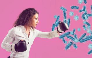 Fight with fists against bacteria and diseases photo