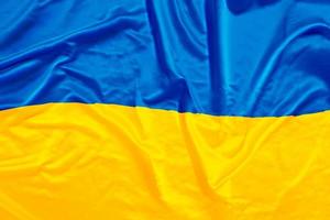 Ukraine country flag banner with wave motion photo