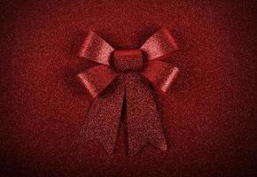 Glittering red ribbon bow for xmas photo