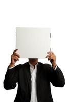 Businessman with blank carton photo