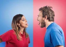 Funny couple joke with grimaces on colored background photo