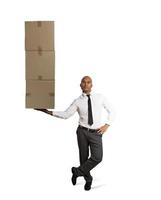 Businessman holds a pile of packages in a hand. concept of fast delivery photo