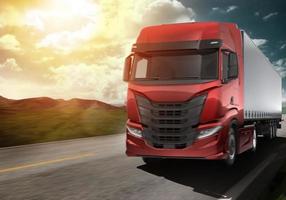 Red modern truck moving fast on the road at sunset with natural landscape photo