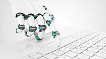 Futuristic white cyborg hand pressing a key on a keyboard photo