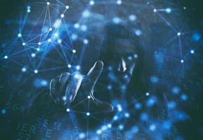 Concept of safety with hacker in a dark environment with digital and network effects photo