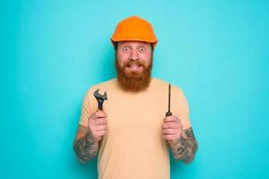 Incompetent worker is unsure and confused about his work photo