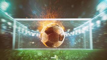 Close up of a fiery soccer ball kicked with power at the stadium scoring a goal photo