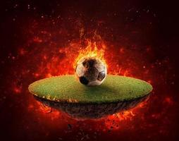 Round portion of football ground with fiery soccer ball photo