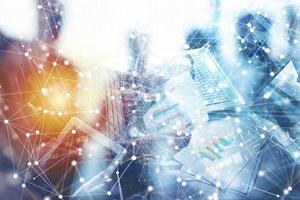 Team of business person works together. Concept of teamwork. Double exposure with internet connection network effects. photo