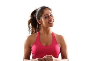 Smiling woman at the gym ready to start fitness lesson photo