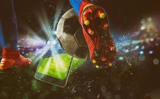 Watch a live sports event on your mobile device. Betting on football matches photo