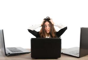Businesswoman stressed at work photo