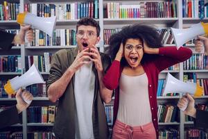 Student are worried and annoyed due to high volume of megaphone in a library photo