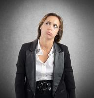 Businesswoman tired and bored by her work photo