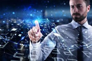 Man connecting to global world. Concept of interconnection, internet and network photo