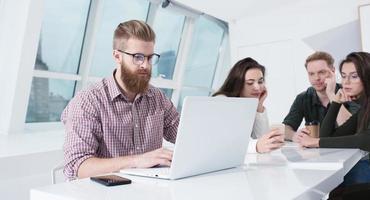 Businessman in office connected on internet network. concept of startup company photo