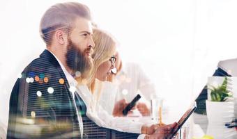 Businessman in office connected to internet network. concept of startup company. double exposure photo