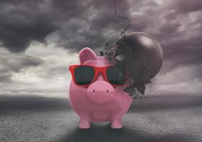 Piggy bank resists a demolition ball during a storm . Reliable and secure financial product photo