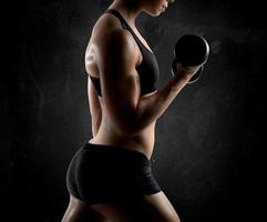 Athletic muscular woman photo