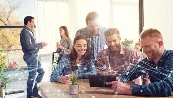 Businessperson in office connected on internet network. concept of partnership and teamwork photo
