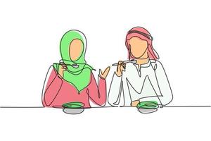 Single continuous line drawing young Arab couple having salad meal around table. Happy male female sitting eating lunch together in restaurant. Dynamic one line draw graphic design vector illustration