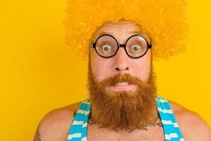 man with yellow beard,wig and glasses photo