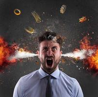 Head explosion of a businessman. concept of stress due to overwork photo