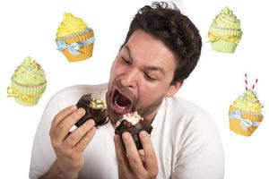 Man is very hungry and eats a lot of cupcake photo